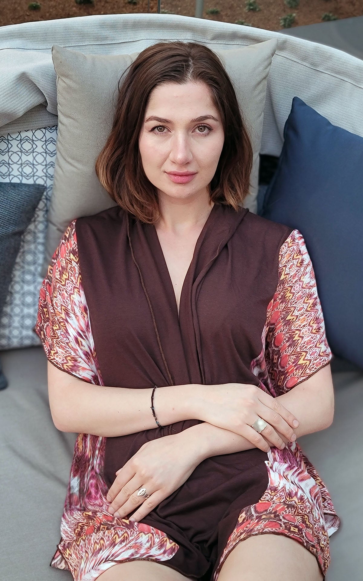 Woman wearing Kaftan in Pink Dream and Terra handmade by Pandemonium Seattle in the USA