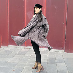 model spinning in faux fur duster handmade usa by pandemonium millinery