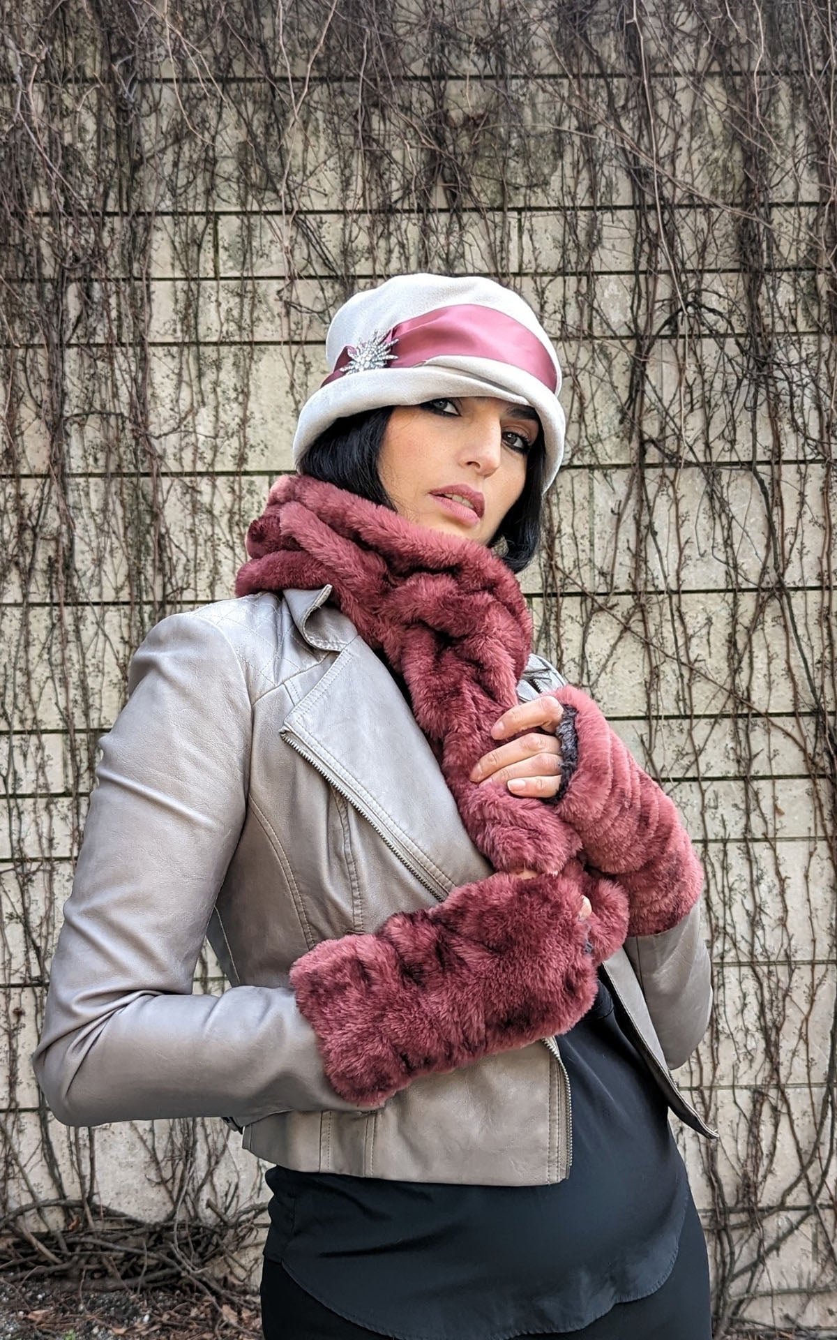 Model is wearing a Royal Opulence Maple Glow faux fur Scarf with matching Fingerless gloves and a Cloche hat by Pandemonium Seattle.