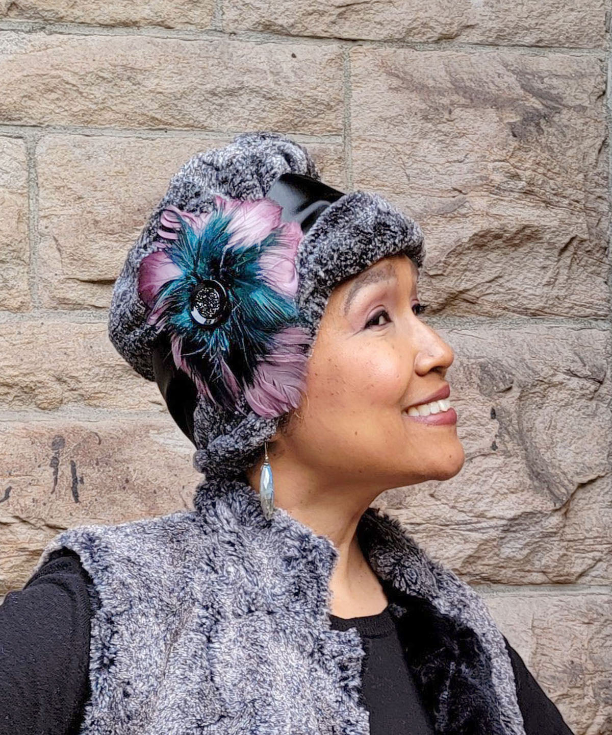 Model wearing Lola in Nimbus Faux Fur with Mauve and Teal Medallion Feather Brooch  | Handmade in Seattle WA | Pandemonium Millinery