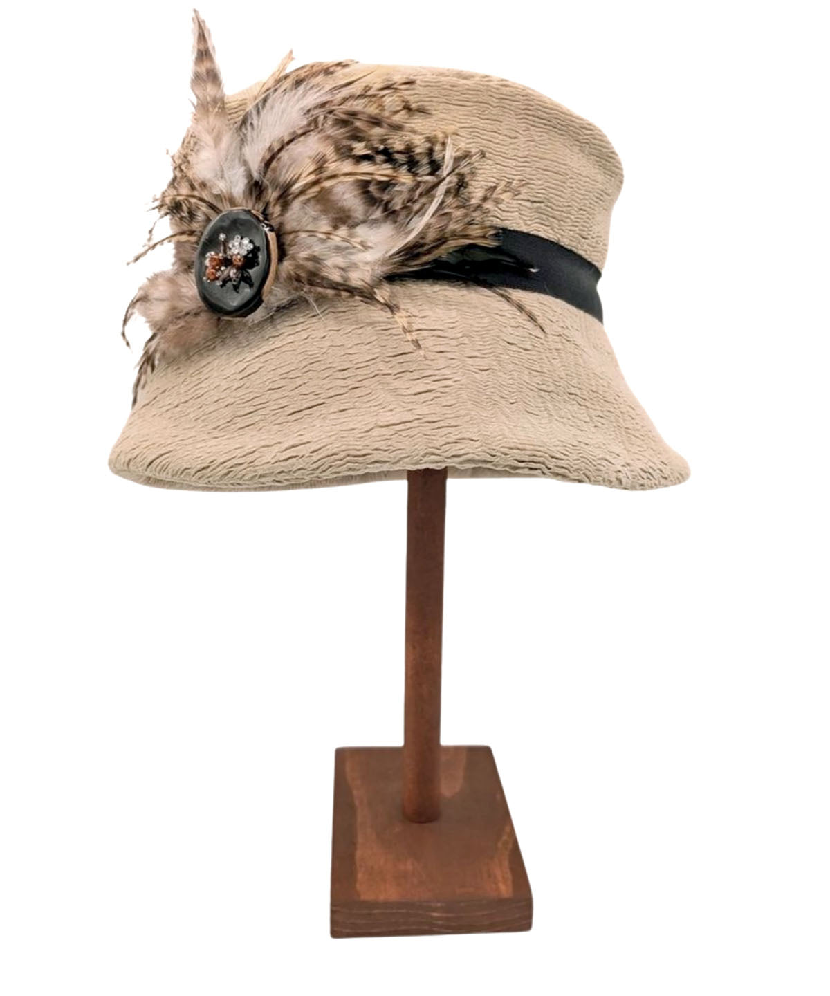 Product Shot of Molly Bucket Style Hat in Evolution in Putty Upholstery with a Chocolate Band featuring a Glass Beaded Button with Feathers | By Pandemonium Millinery | Seattle WA USA