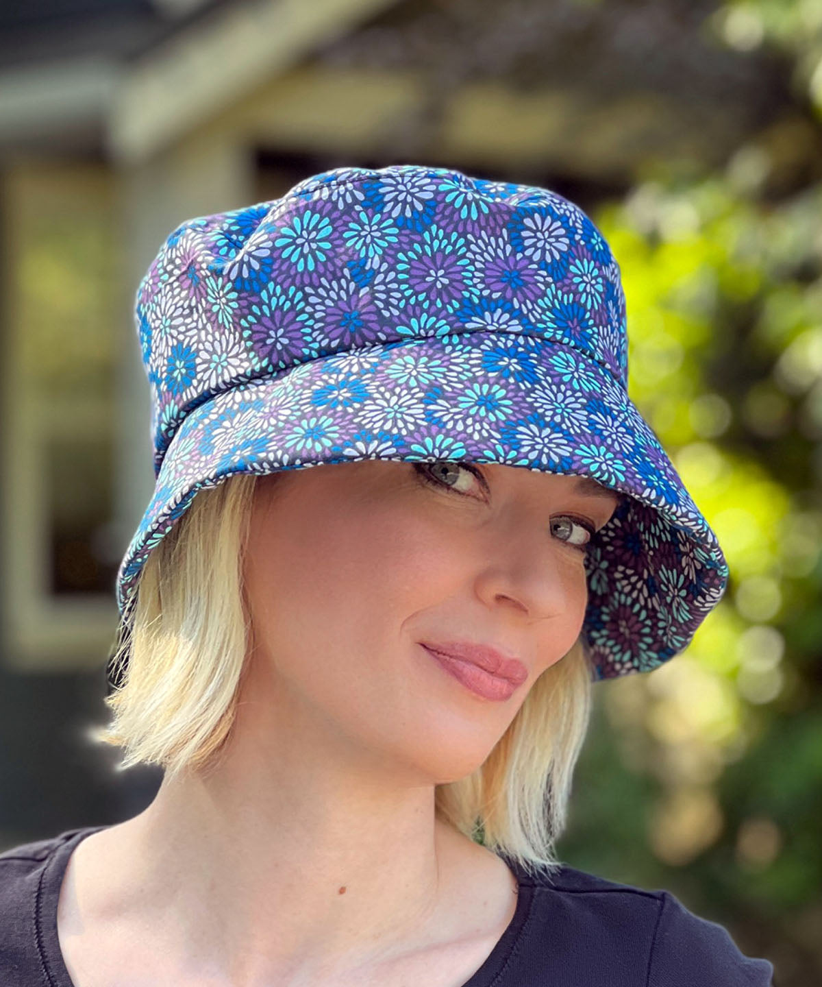 Close up of Molly Bucket Style Hat in Blue and Purple Floral Blossom Cotton | Handmade By Pandemonium Millinery in Seattle WA