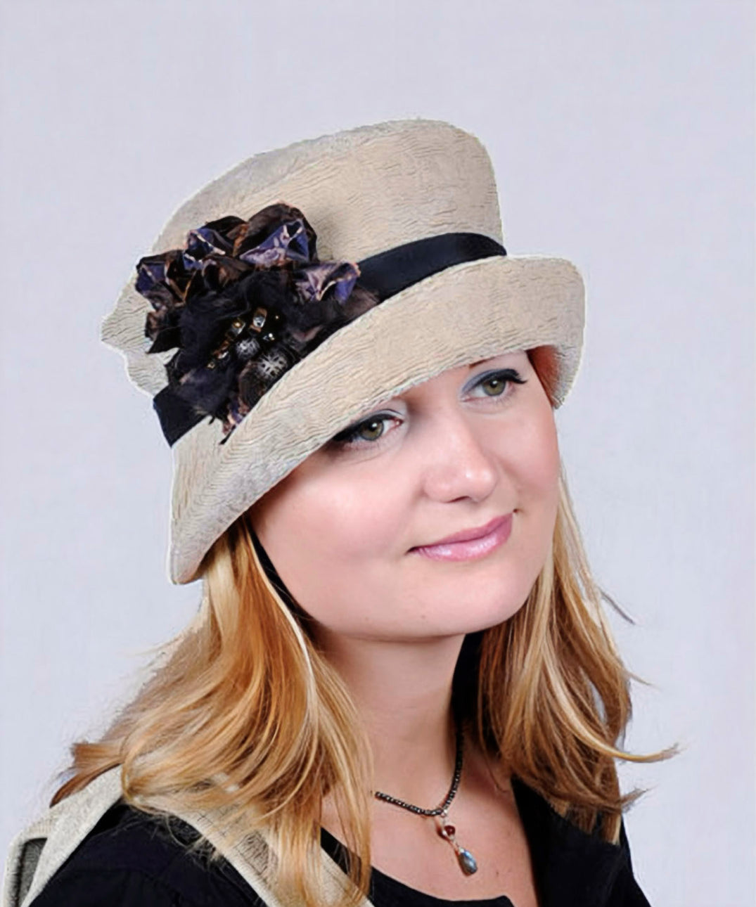 Model Shot of Molly Bucket Style Hat in Evolution in Putty Upholstery | By Pandemonium Millinery | Seattle WA USA