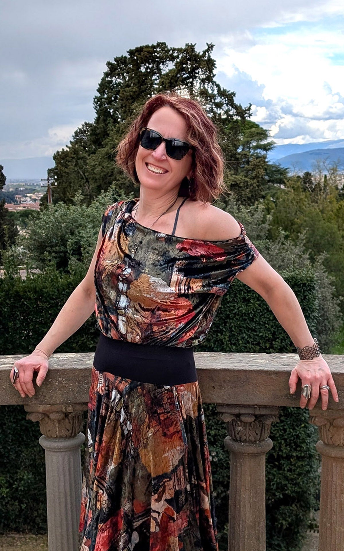 Close up of woman wearing off-shoulder Roma Top in Grand Canyon Velvet handmade in Seattle WA by LYC