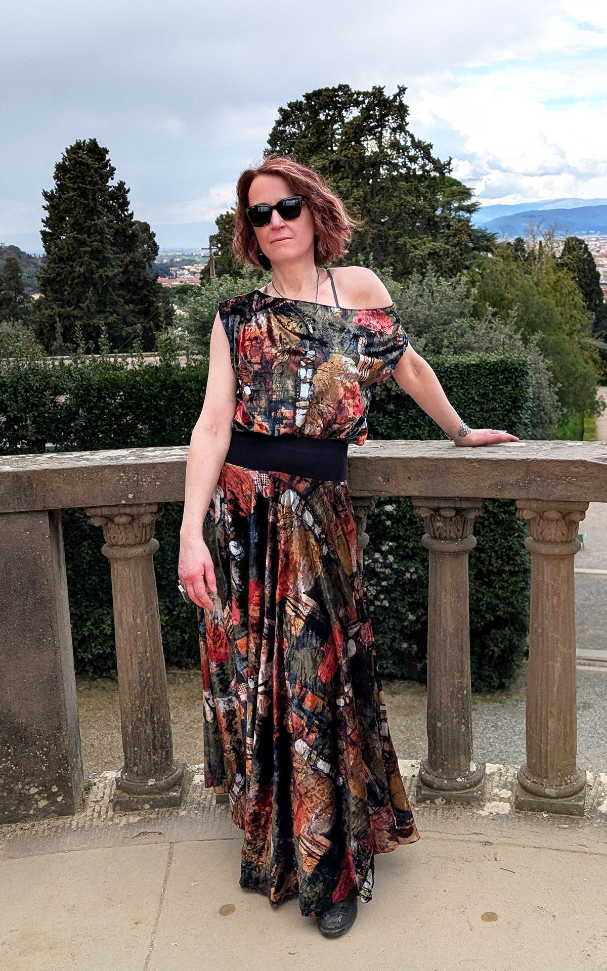 Woman wearing Roma Top in Grand Canyon Velvet with matching skirt handmade in Seattle WA by LYC