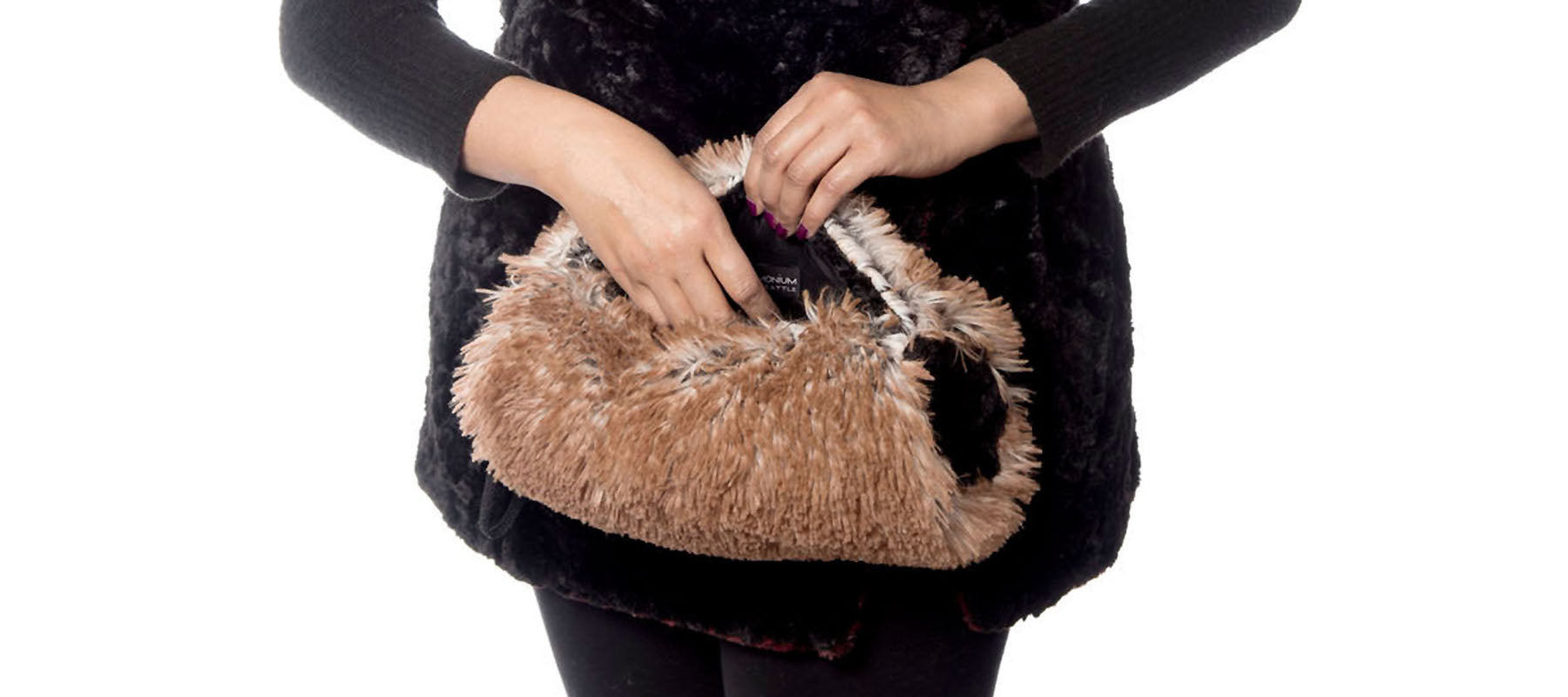 Hand reaching into zipper pocket of Red Fox Faux Fur Muff