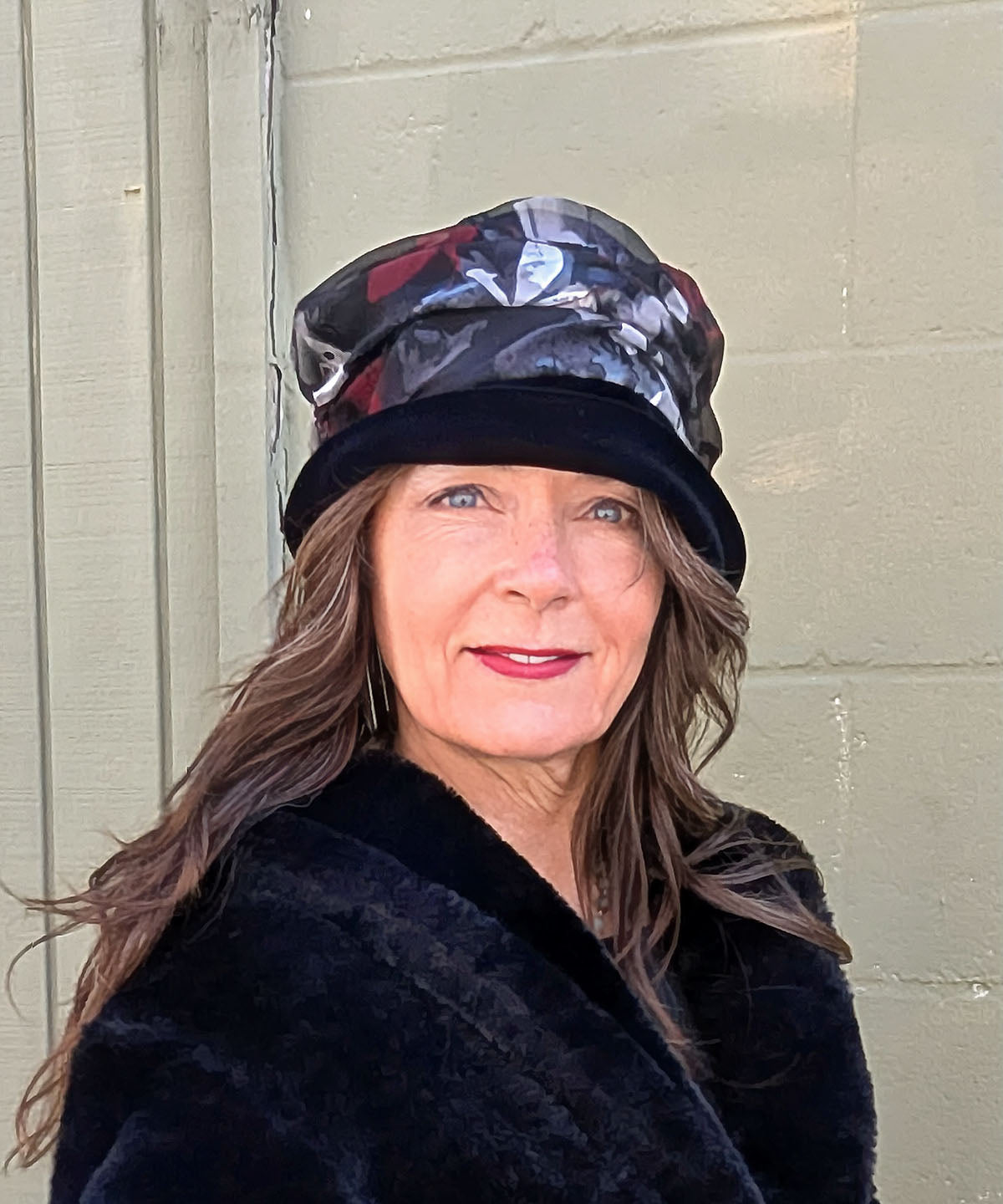 Model wearing Ana Cloche Hat | Black Velvet with Garden Path Poppy Band | Handmade in Seattle WA| Pandemonium Millinery