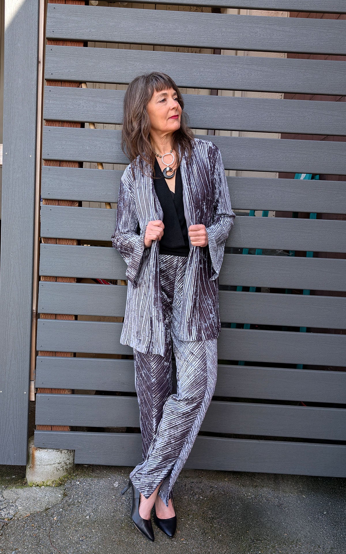 Woman wearing Slice of Life pants and cardigan in socialite Pleated Velvet handmade in USA by Pandemonium Seattle
