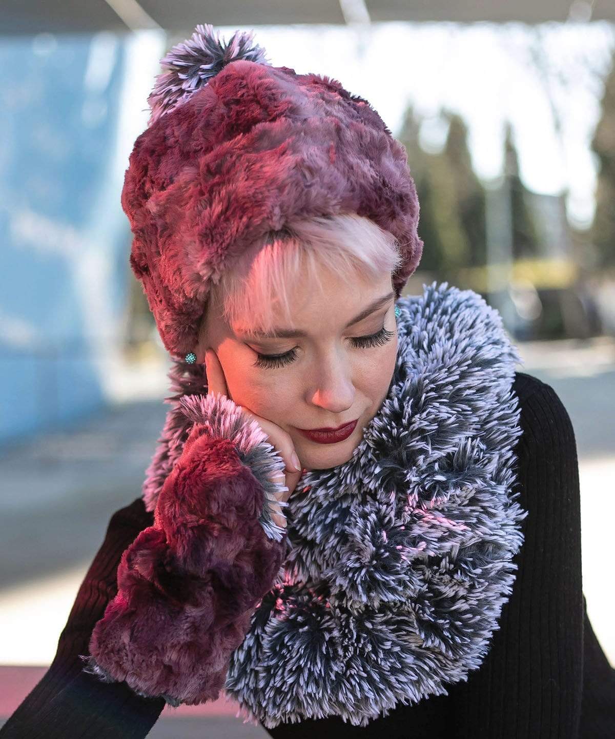Woman modeling Beanie Hat, reversible in Luxury Faux Fur - Highland Thistle with matching gloves. Pandemonium Millinery in Seattle, WA.