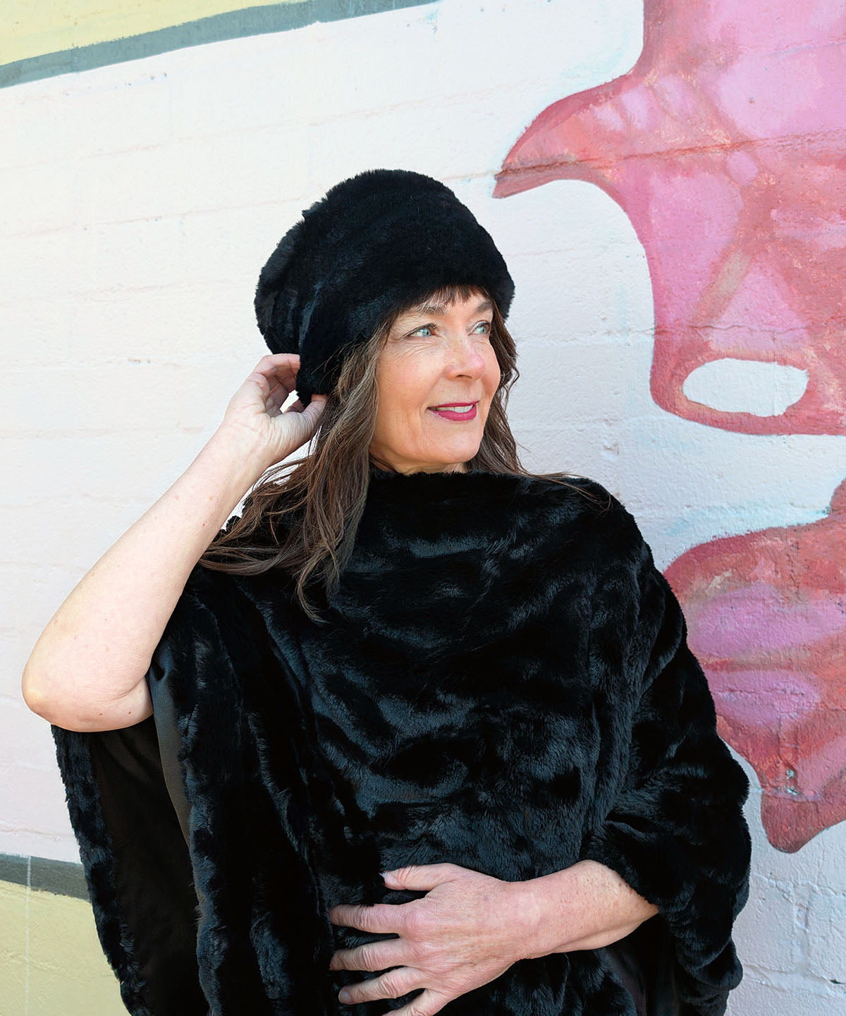 Close up shot of Model wearing a Poncho | Royal Opulence Faux Fur in Onyx | Pandemonium Millinery | Seattle, WA USA