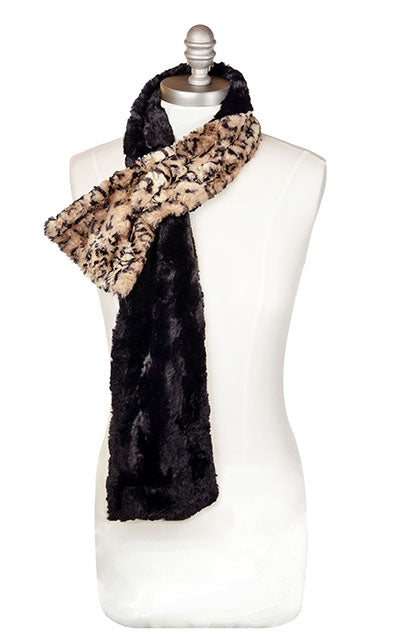 Product shot of Women’s reversible Long Pull Through Scarf | Carpathian Lynx animal print faux fur in browns and creams with cuddly fur in black | Handmade in Seattle WA | Pandemonium Millinery