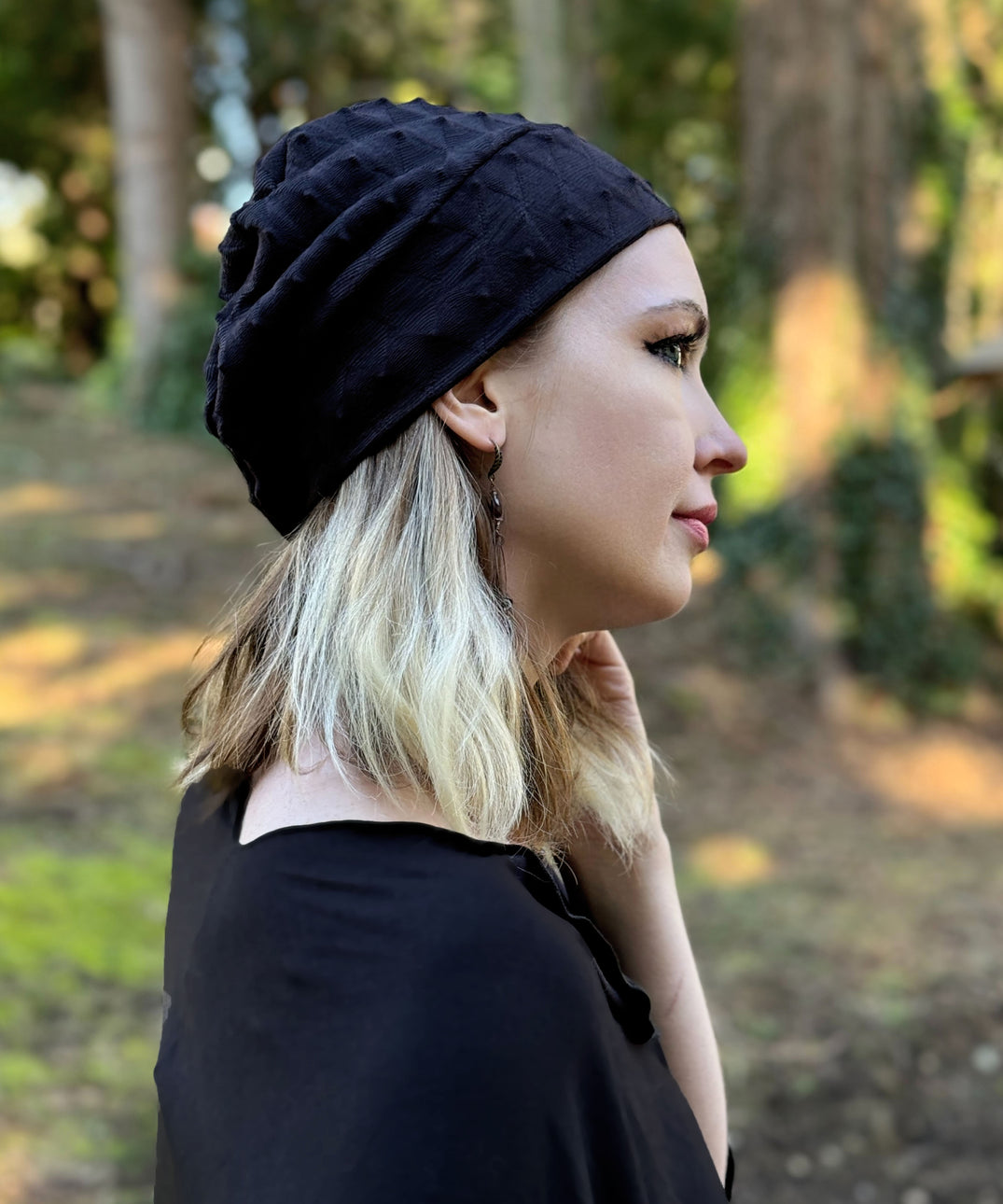 Rowdie Hat in Fractal Black, shown on model. LYC by Pandemonium is handmade by Pandemonium Seattle.