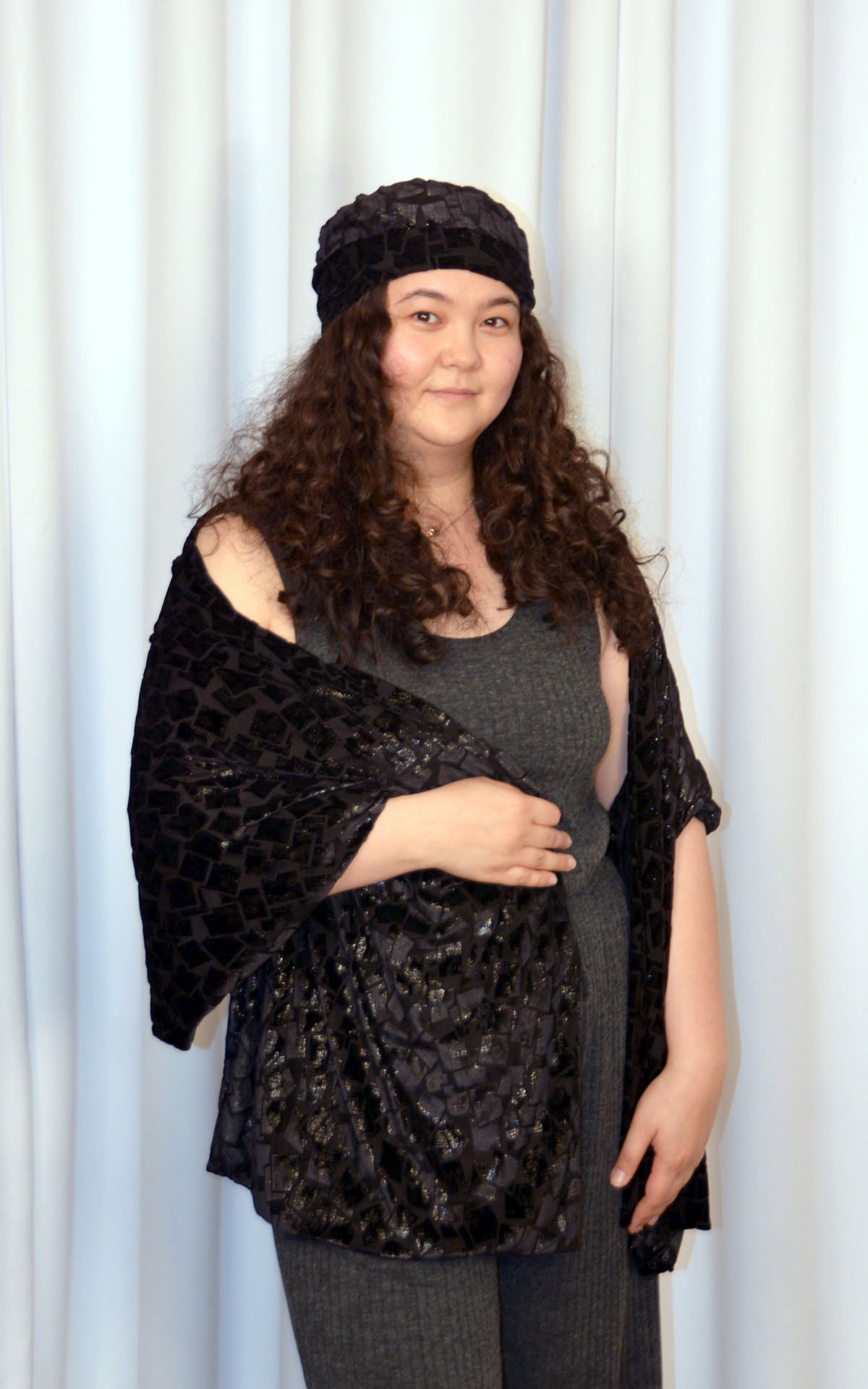 Woman wearing Evening Wrap with matching hat in Wild Nights, a sparkly, black, Burnout Velvet handmade in USA by Pandemonium Seattle