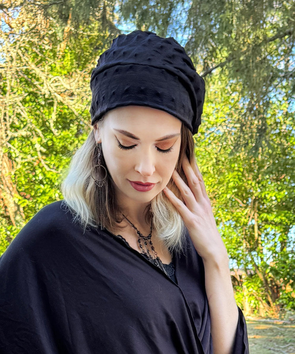 Rowdie Hat in Black Fractal, shown on model. LYC by Pandemonium is handmade by Pandemonium Seattle.