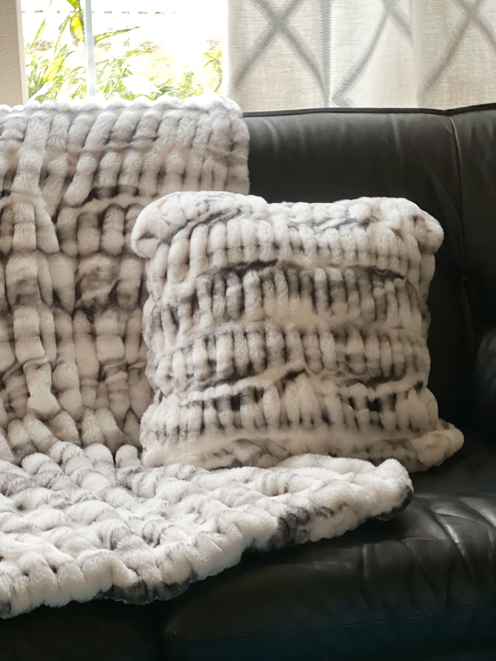 Matching standard throw and throw pillow in Royal Opulence Aspen. Made by Pandemonium Seattle.