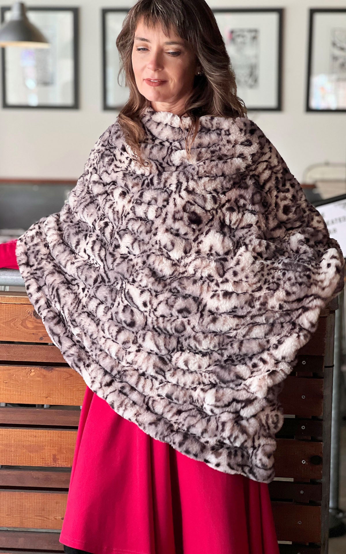 Model wearing Royal Opulence Poncho in Snow Leopard close up, handmade by Pandemonium Seattle