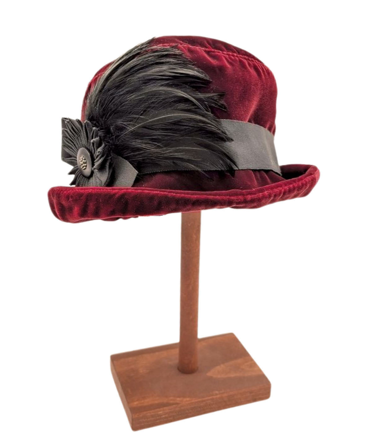 Woman wearing Samantha Hat in Bordeaux Velvet with a Black Grosgrain Band and Medallion with Button and Feathers with cuffed brim | Handmade in Seattle, WA USA | Pandemonium Millinery