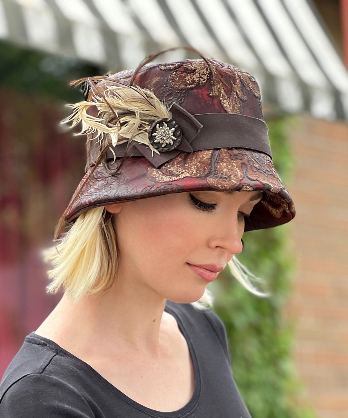 Samantha Bucket Hat | Renaissance In Ox Blood Upholstery | Feather and Button Brooch | Handmade in Seattle, WA USA by Pandemonium Millinery