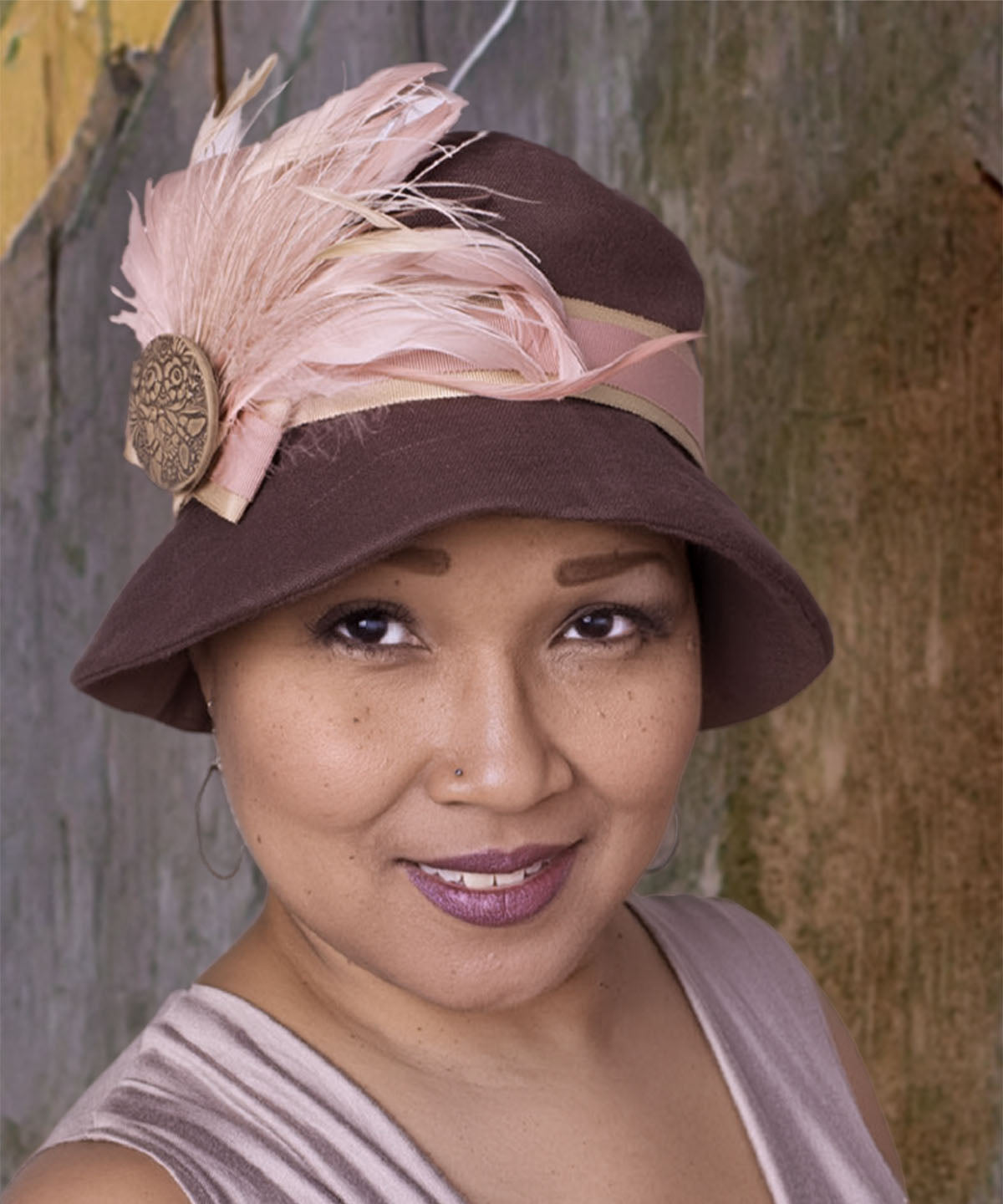 Woman wearing Samantha Hat Linen in Chocolate | Pink and Beige Band with Pink Feather Brooch featuring Hand Painted Button | Handmade By Pandemonium Millinery | Seattle WA