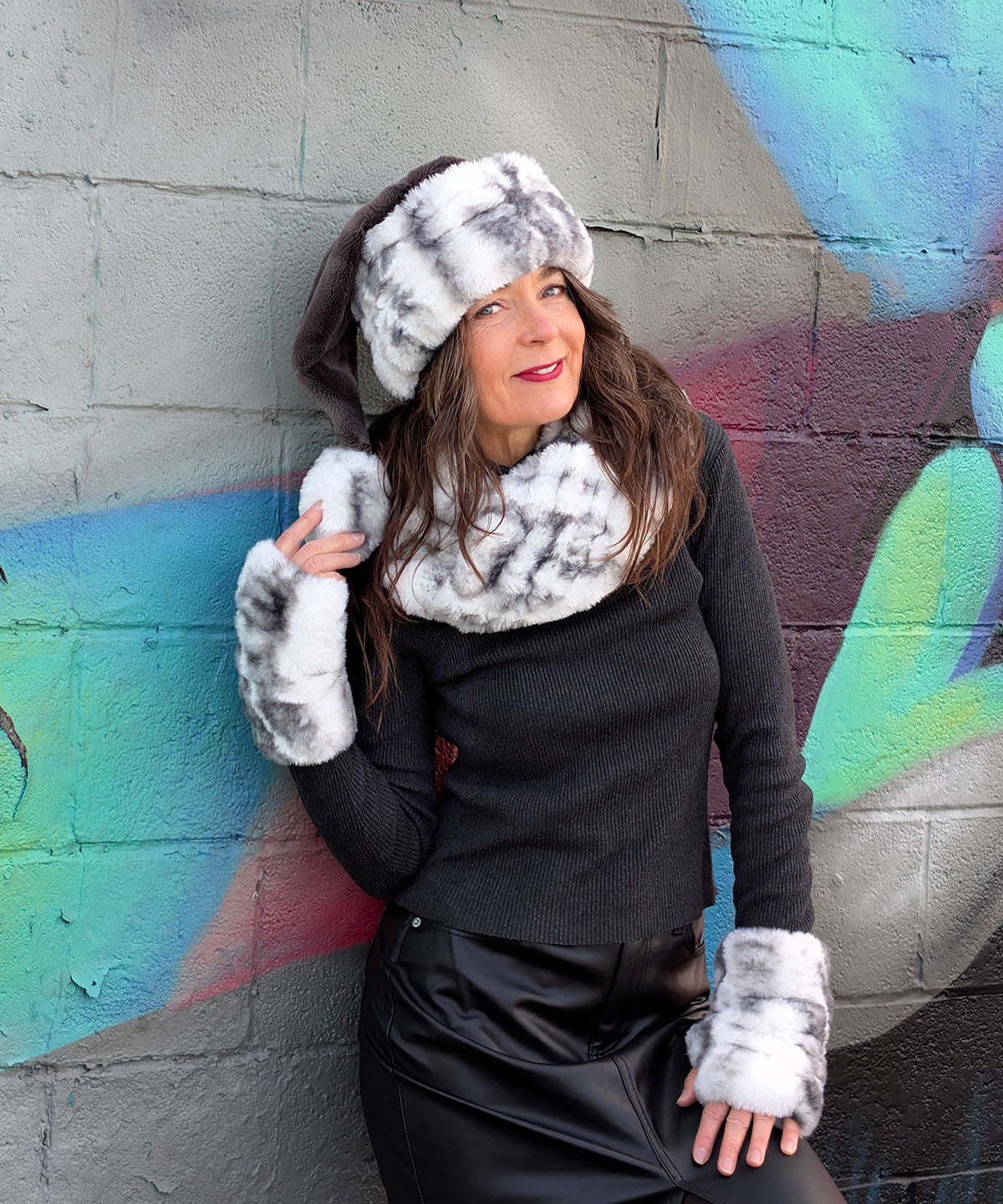 Woman wearing Santa Hat  featuring matching Fingerless Gloves and Neckwarmer | Royal Opulence in Aspen Faux Fur | Pandemonium Seattle | Handmade in Seattle WA