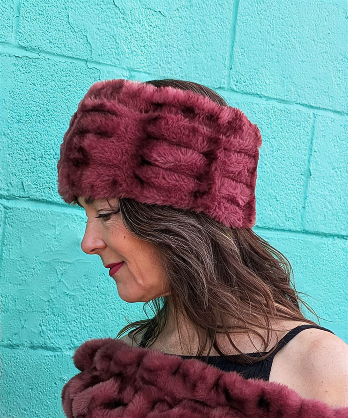 Model smilling wearing Ear Neck Cozy | Royal Opulence Meadow Glow Faux Fur | Handmade in Seattle WA | By  Pandemonium Seattle.