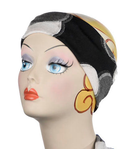 Mannequin Product shot of wide Headband | Super Nova Black and White Circular Fabric | | Handmade by Pandemonium Millinery Seattle, WA USA