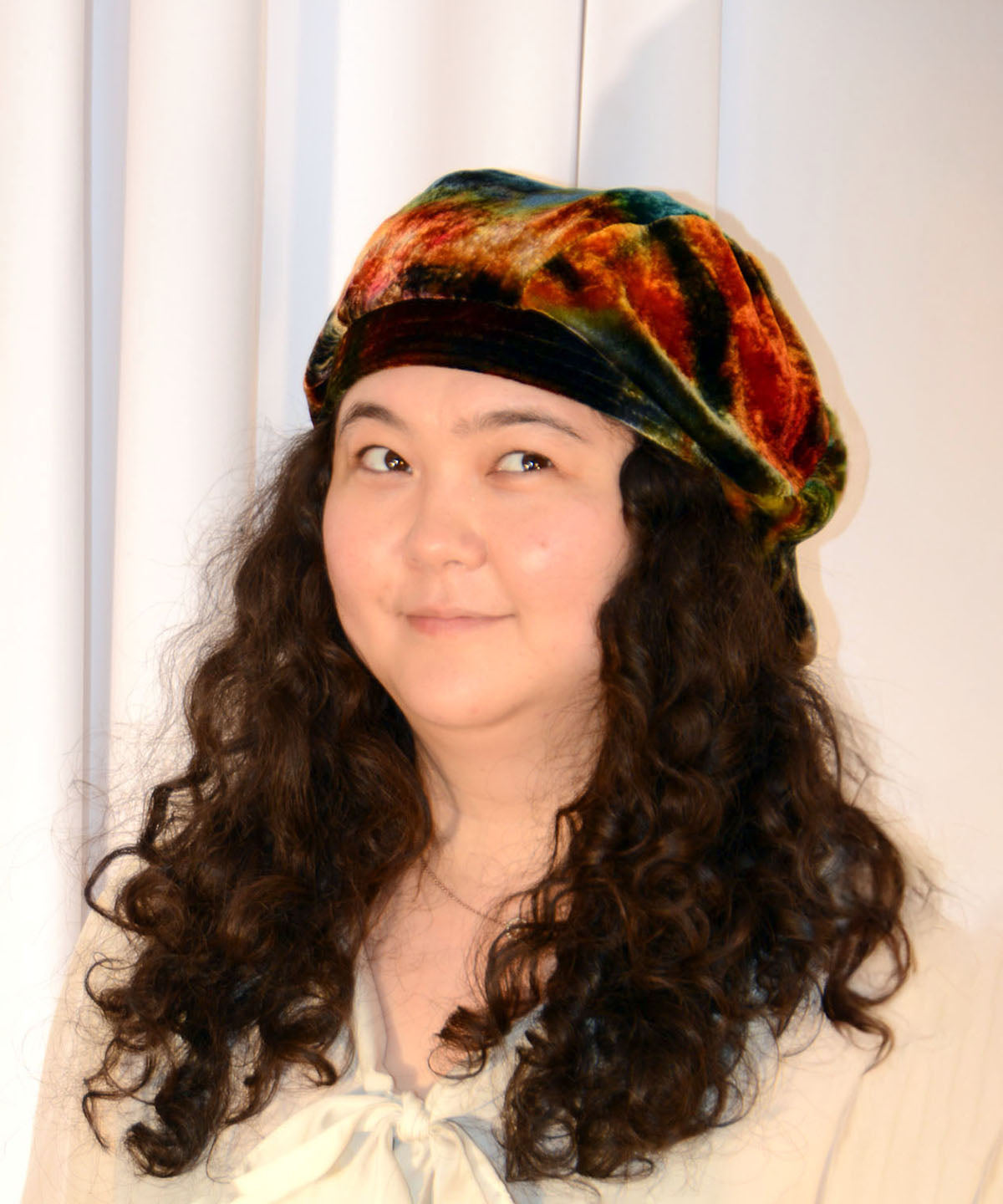 Model wearing a Oversize Beret in Velvet in Hippy Tie Dye | Handmade by Pandemonium Millinery | Seattle WA USA