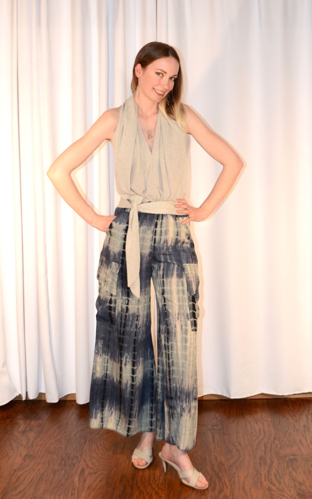 woman wearing cargo pants in blue tea time II and swallowtail sash top in sandstone desert crepe handmade by LYC x Pandemonium in Seattle, WA, USA