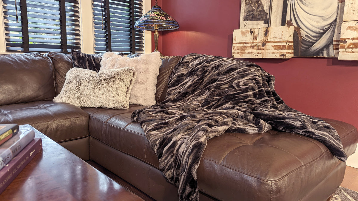 Living room with Throw in Black Marble Dune Faux Fur handmade in Seattle, WA USA by Pandemonium Millinery