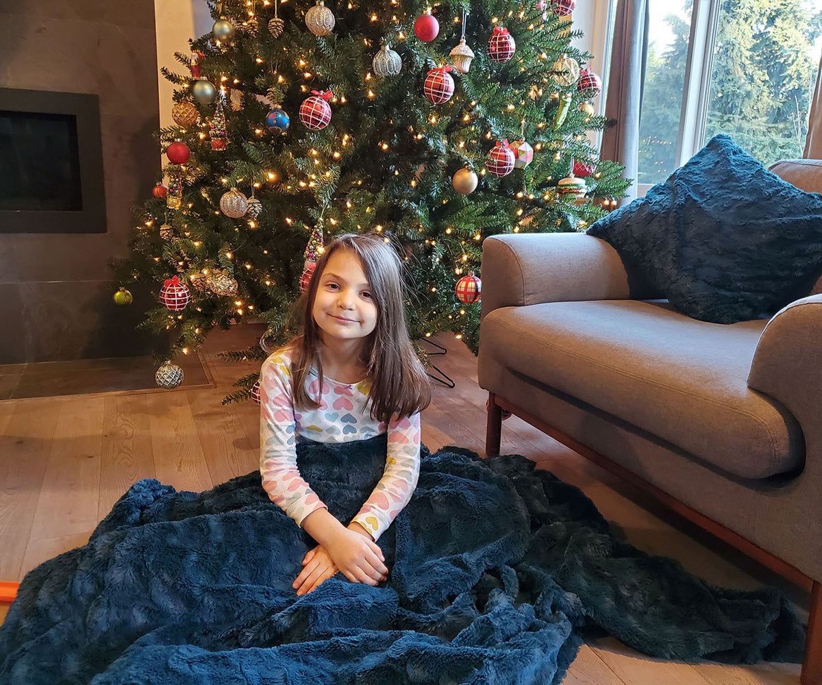 Girl with Peacock Pond Luxury Faux Fur Throw | Pandemonium Millinery