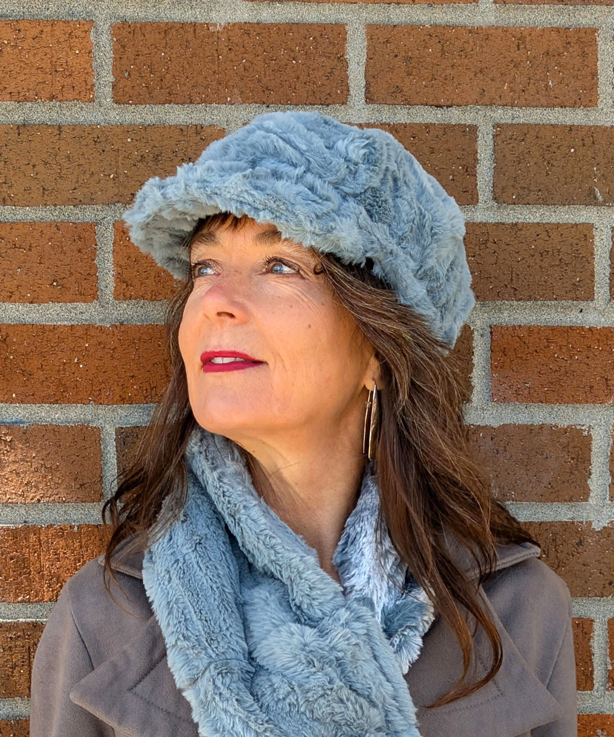 Model wearing Valerie Hat | Cirrus Faux Fur in Blue Mist | Side View | Handmade in Seattle WA USA | By Pandemonium MIllinery