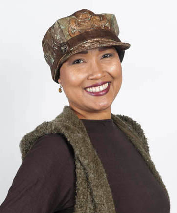 Pandemonium Millinery | Model wearing the Valerie  hat, newsboy, apple cap Style | Everglade, Green and Brown Upholstery Fabric|  Handmade in Seattle  WA  USA