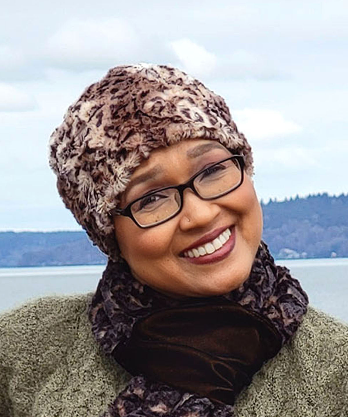 Woman wearing Cuffed Pillbox | Carpathian animal print Faux Fur | Handmade USA by Pandemonium Seattle