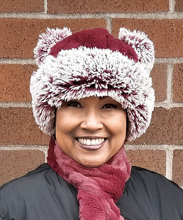 Woman wearing Bear Beanie Hat with ears, in Berry Foxy Cranberry Creek Faux Fur and Red Fox Faux Fur. Handmade by Pandemonium Millinery.