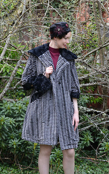 Crawford Coat 8mm in Black and White with Cuddly Black Lining Model Shot with Lola Cloche Hat by Pandemonium Millinery