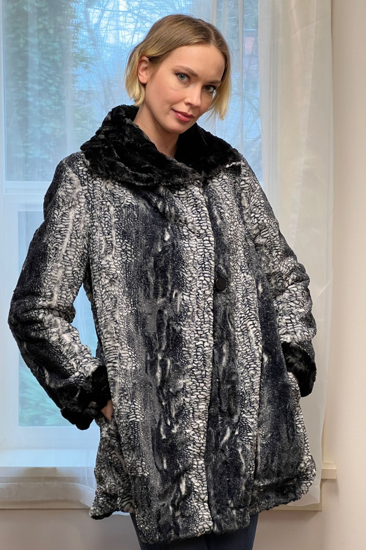 Model wearing Hepburn Swing Coat | Black Mamba Black and White Faux Fur with Cuddly Chocolate Faux Fur | Handmade in Seattle WA | By Pandemonium Millinery