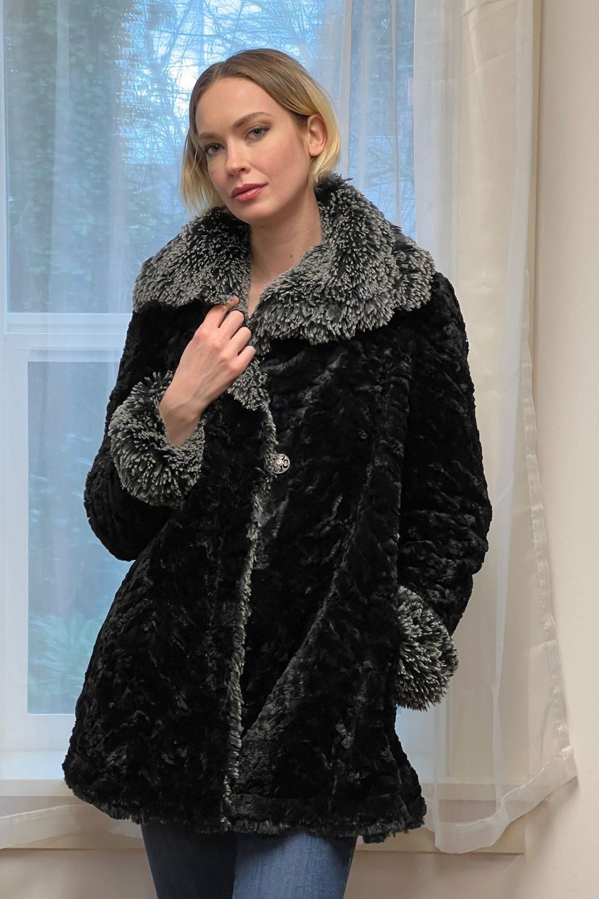 Woman wearing Hepburn Swing Coat, reversed | Silver Tip Fox in Black Long Hair  Faux Fur with Cuddly Black Faux Fur | Handmade in Seattle WA | By Pandemonium Millinery