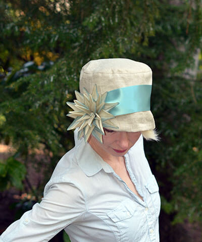 Lola Hat in Oatmeal Linen with Large Flower Brooch Top View Handmade by Pandemonium Seattle