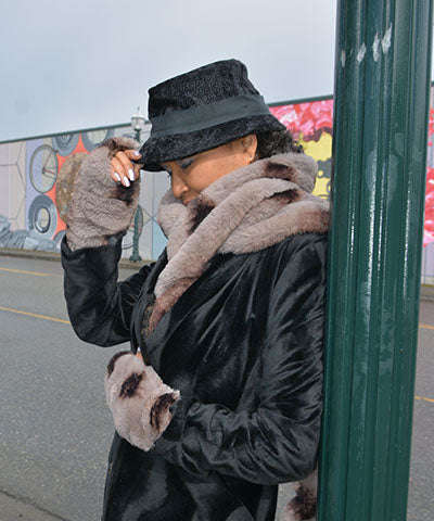 Model in Black Coat wearing Royal Opulence Fingerless Gloves in Taupeful. Made in Seattle, WA, USA. Pandemonium Seattle.