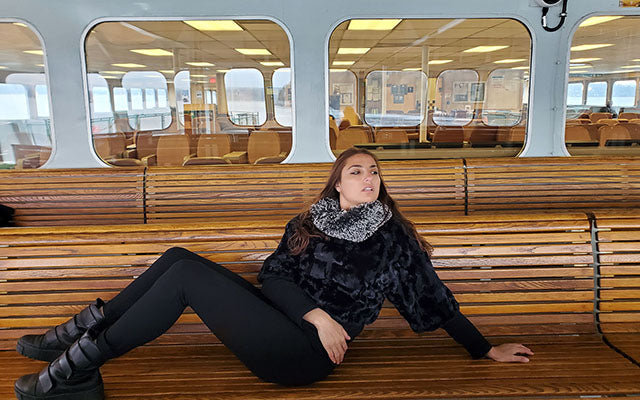 Smiling model wearing Sweater Top | Cuddly Faux Fur Black with Silver Tip Fox in Black Faux Fur Long Hair Collar | Handmade By Pandemonium Millinery | Seattle WA USA