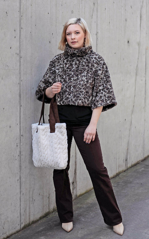 Model in Sweater Top - Short - in Calico Faux Fur   by Pandemonium Millinery