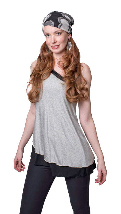 Model wearing the Swing Top an asymmetrical top| A  lightweight Jersey Knit in Silvery Gray and Black | Handmade in Seattle WA | Pandemonium Millinery