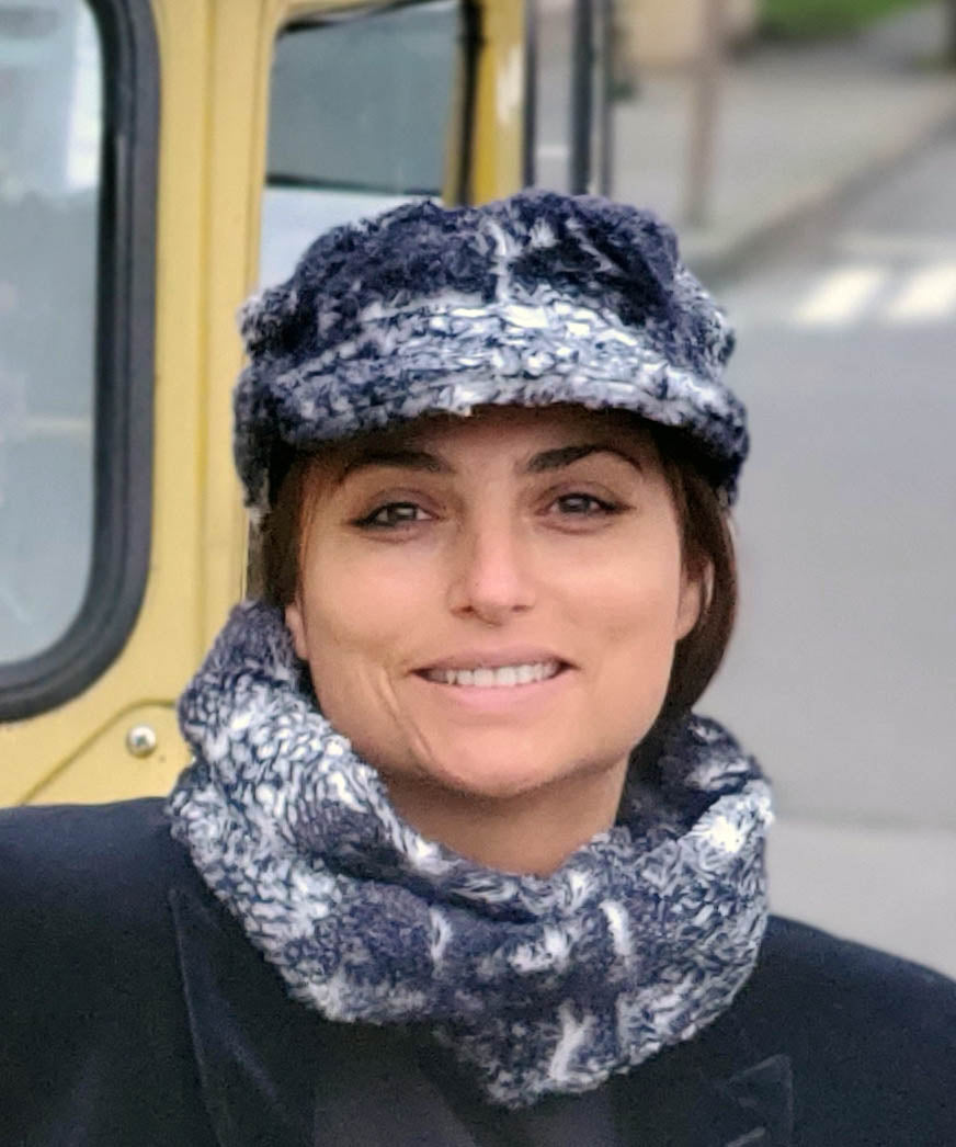 Model wearing the Valerie Cap and Neck warmer in Black Mamba made in Seattle, WA USA