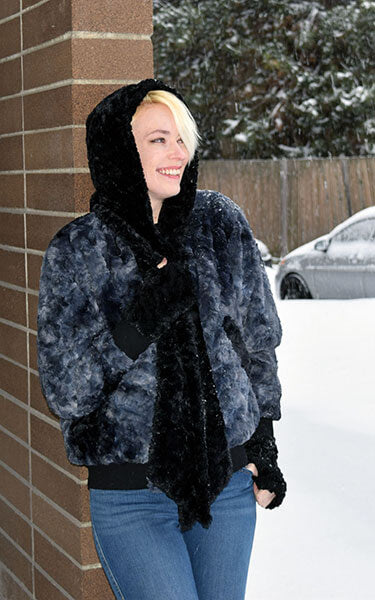 Model is wearing Hoody Scarf in Cuddly Fur in Black