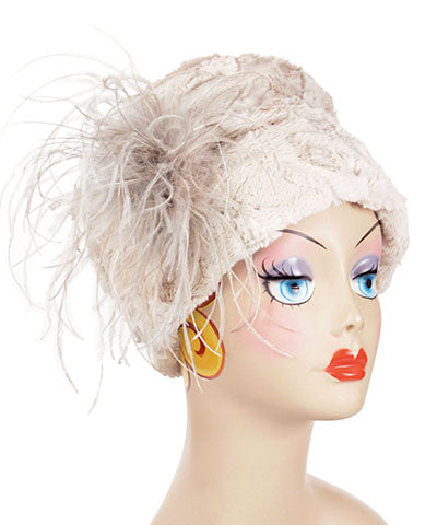 Side view of Ana Cloche Hat in Sand Cuddly Faux Fur with Cream Ostrich Feather Brooch| Handmade in Seattle WA| Pandemonium Millinery