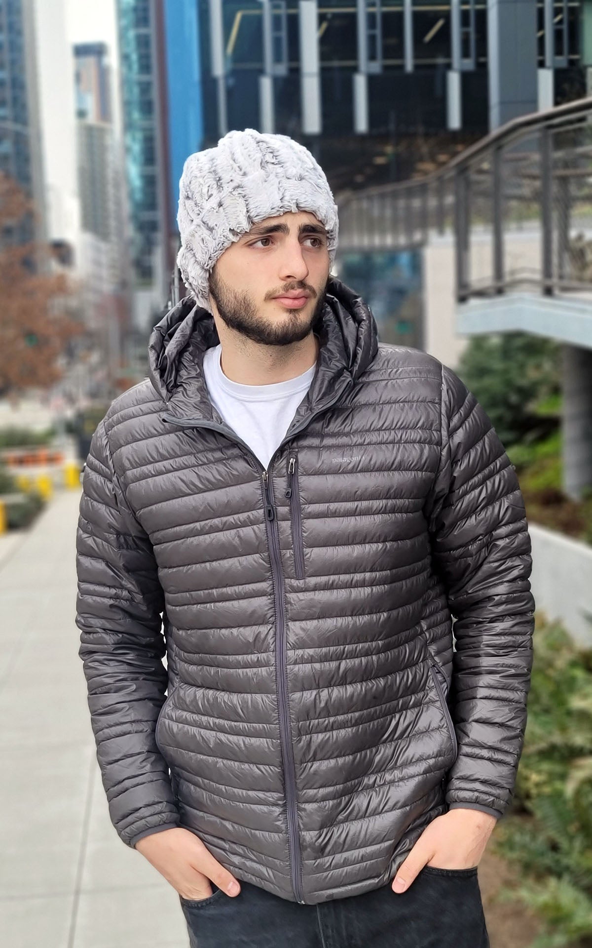 Man wearing Beanie in Khaki faux fur. Handmade by Pandemonium Seattle.