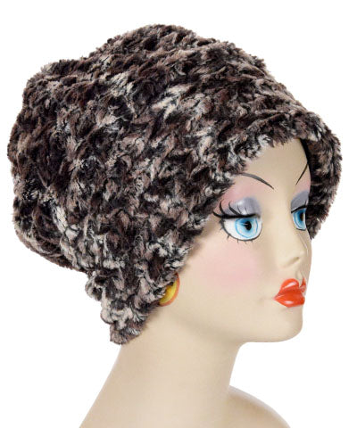 Beanie Hat reversible in Calico and Cuddly Chocolate Faux Fur, shown uncuffed. Handmade by Pandemonium Millinery in Seattle, WA.