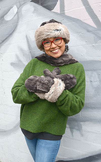 Modeling wearing Beanie Hat shown in reverse in Arctic Fox and Espresso Bean Faux Fur. Handmade by Pandemonium Millinery in Seattle, WA.