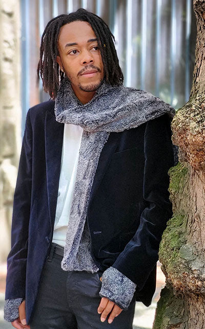 Man modeling Luxury Faux Fur Classic Scarf in Nimbus. Pandemonium Millinery.