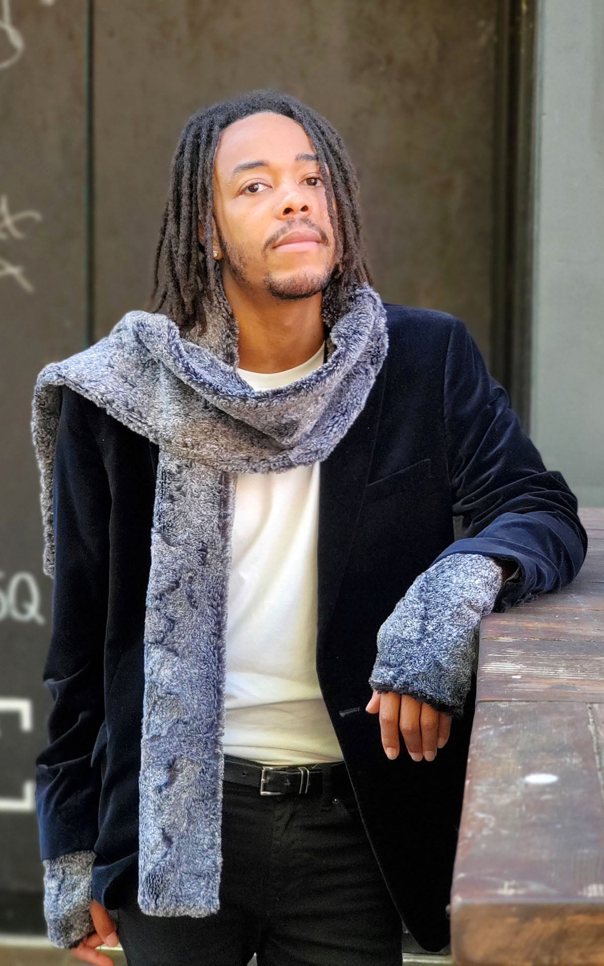 Man modeling Men's Classic Skinny Scarf in Nimbus Luxury Faux Fur. Pandemonium Millinery.